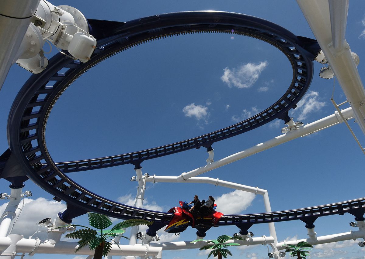 PORT CANAVERAL, FLORIDA, UNITED STATES - JULY 30: People ride the roller coaster on Carnival Cruise Line ship Mardi Gras during a preview for travel agents and media on July 30, 2021 in Port Canaveral, Florida. The ship, the first to feature a roller coaster, will make its maiden voyage on July 31, 2021 when it sets sail on a seven-day cruise to the eastern and western Caribbean. This will be the first cruise from Port Canaveral with paying passengers since March of 2020 when the cruise industry shut down amid the coronavirus pandemic. Paul Hennessy / Anadolu Agency (Photo by Paul Hennessy / ANADOLU AGENCY / Anadolu Agency via AFP)