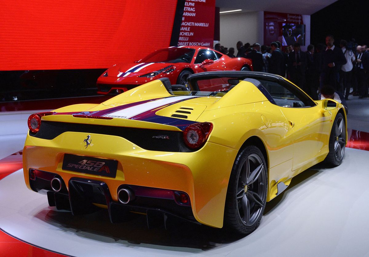 The new Ferrari 458 Speciale A is presented at the 2014 Paris Auto Show on October 2, 2014 in Paris, on the first of the two press days. AFP PHOTO/MIGUEL MEDINA (Photo by MIGUEL MEDINA / AFP)