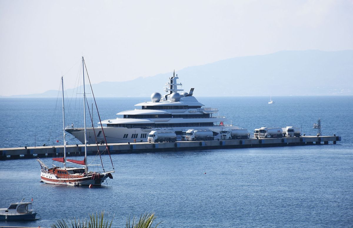 MUGLA, TURKEY - FEBRUARY 18: The 106m-long and 18m-high super luxury motor yacht Amadea, one of the largest yacht in the world is seen after anchored at pier in Pasatarlasi for bunkering with 9 fuel trucks, on February 18, 2020 in Bodrum district of Mugla province in Turkey. Amadea, the Cayman-flagged motor yacht, arrived from France and entered in Turkey passing through Greece. Amadeus's interior layout sleeps up to 16 guests in 8 cabins, including a master suite, a VIP stateroom, with a helipad. Osman Uras / Anadolu Agency (Photo by Osman Uras / ANADOLU AGENCY / Anadolu Agency via AFP)