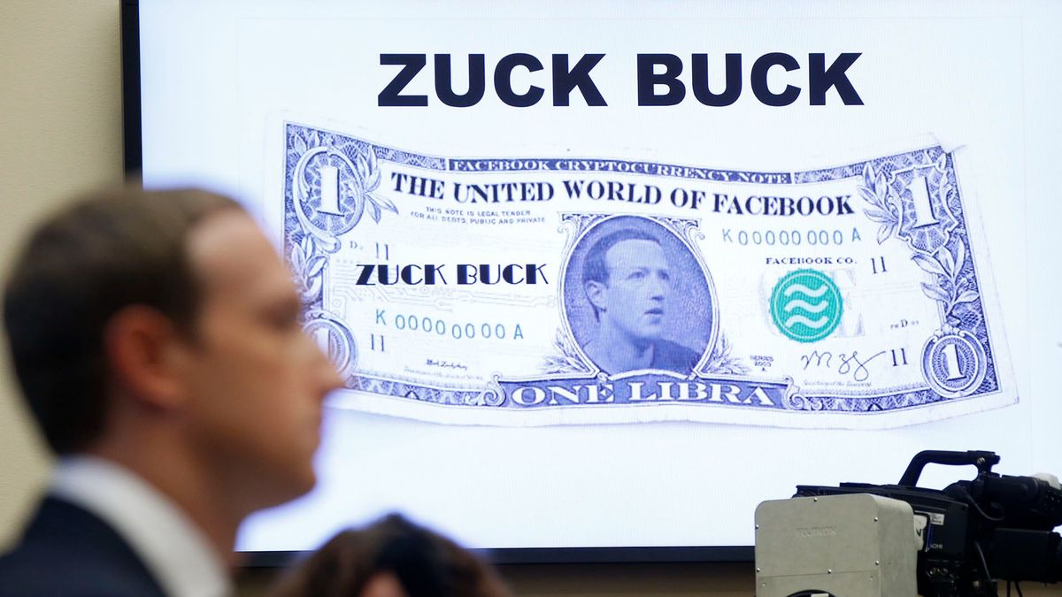 A monitor displays a "Zuck Buck" as Mark Zuckerberg, chief executive officer and founder of Facebook Inc., testifies during a House Financial Services Committee hearing in Washington, D.C., U.S., on Wednesday, Oct. 23, 2019. Zuckerberg put on his game face to convince a skeptical Congress that his company's ambitious plans for a cryptocurrency will benefit millions of poor and underbanked people around the world, and that the technology behind it should be developed by an American firm or risk being one-upped by China, which doesnt share the same values as the U.S. Photographer: Andrew Harrer/Bloomberg via Getty Images 1177744177