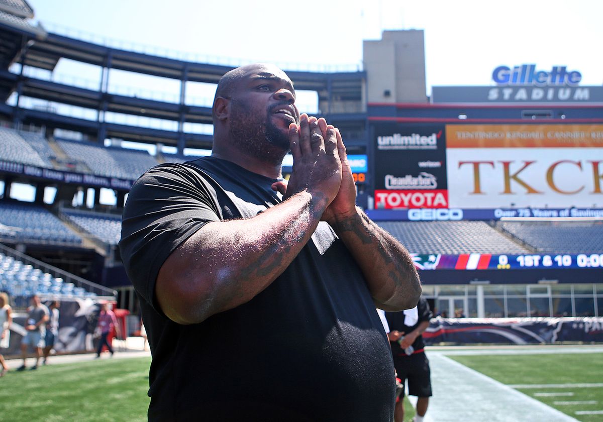 (080917 Foxboro, MA) Vince Wilfork walks through Gillette Stadium after signing a contract to retire as a New England Patriot on Wednesday, August 9, 2017. Staff Photo by Nancy Lane