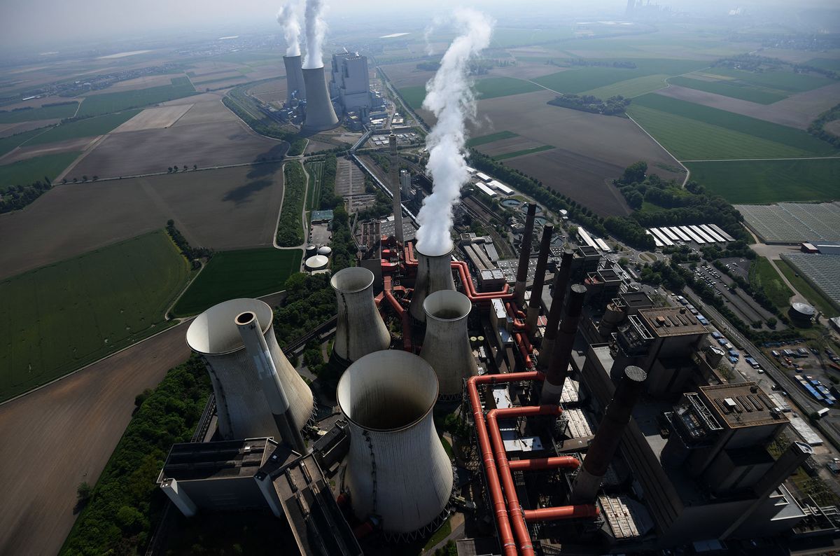 An aerial view shows the coal-fired power station of German energy giant RWE in Neurath, western Germany, on May 8, 2020. (Photo by Ina FASSBENDER / AFP)