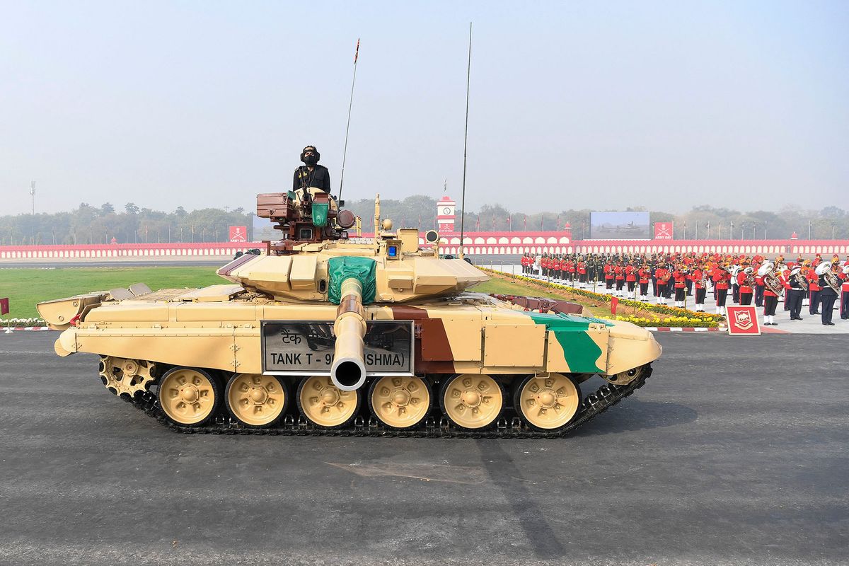 Army soldiers in a T-90 tank march past during a ceremony to celebrate India's 73rd Army Day in New Delhi on January 15, 2021. (Photo by Prakash SINGH / AFP)