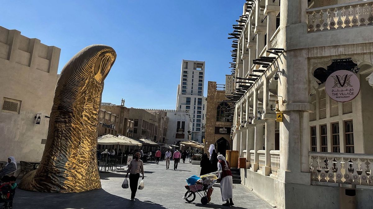 DOHA, QATAR - DECEMBER 6: A view of the Golden Thumb Satatue in the streets of Souq Waqif, a marketplace in Doha, capital and most populous city of Qatar on December 6, 2021. Doha is set to host the 2022 FIFA World Cup. Emrah Yorulmaz / Anadolu Agency (Photo by Emrah Yorulmaz / ANADOLU AGENCY / Anadolu Agency via AFP)