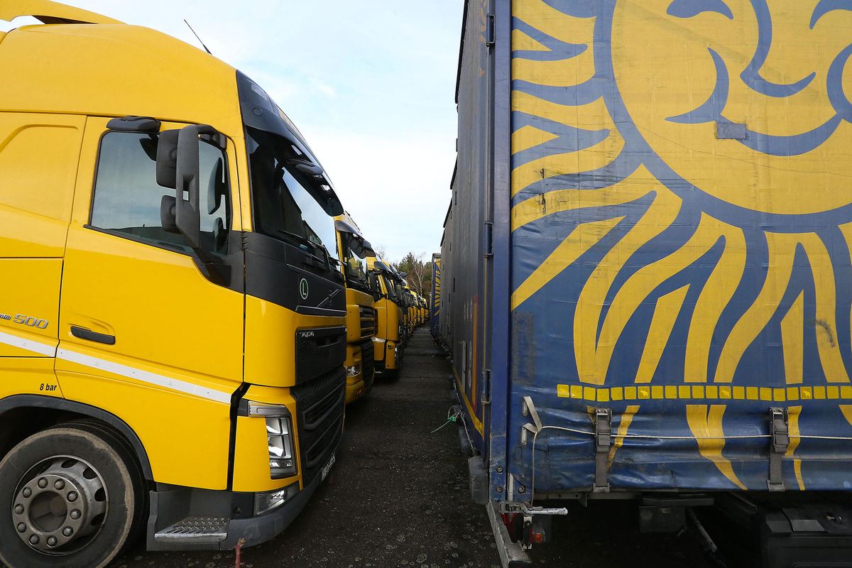 Illustration picture shows  trucks of Hungarian transport company Waberer parked at the industrial area in Opglabbeek, Limburg province, Friday 23 December 2016. The Eastern European drivers are brought home to their homeland for the holidays.BELGA PHOTO NICOLAS MAETERLINCK (Photo by NICOLAS MAETERLINCK / BELGA MAG / Belga via AFP)