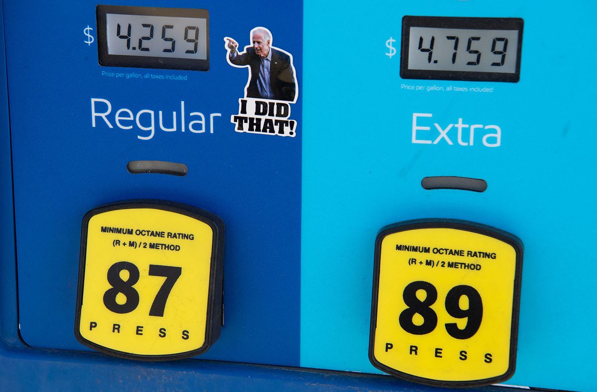 (FILES) In this file photo taken on March 16, 2022, a gas pump displays current fuel prices, along with a sticker of US President Joe Biden, at a gas station in Arlington, Virginia. - US gas prices reached a record high on May 10, 2022, as President Joe Biden said fighting inflation is his "top domestic priority." The price at the pump hit $4.37 per gallon, according to the American Automobile Association (AAA), surpassing the last record of $4.33 set on March 11. The average price per gallon a year ago was $2.97. (Photo by SAUL LOEB / AFP)