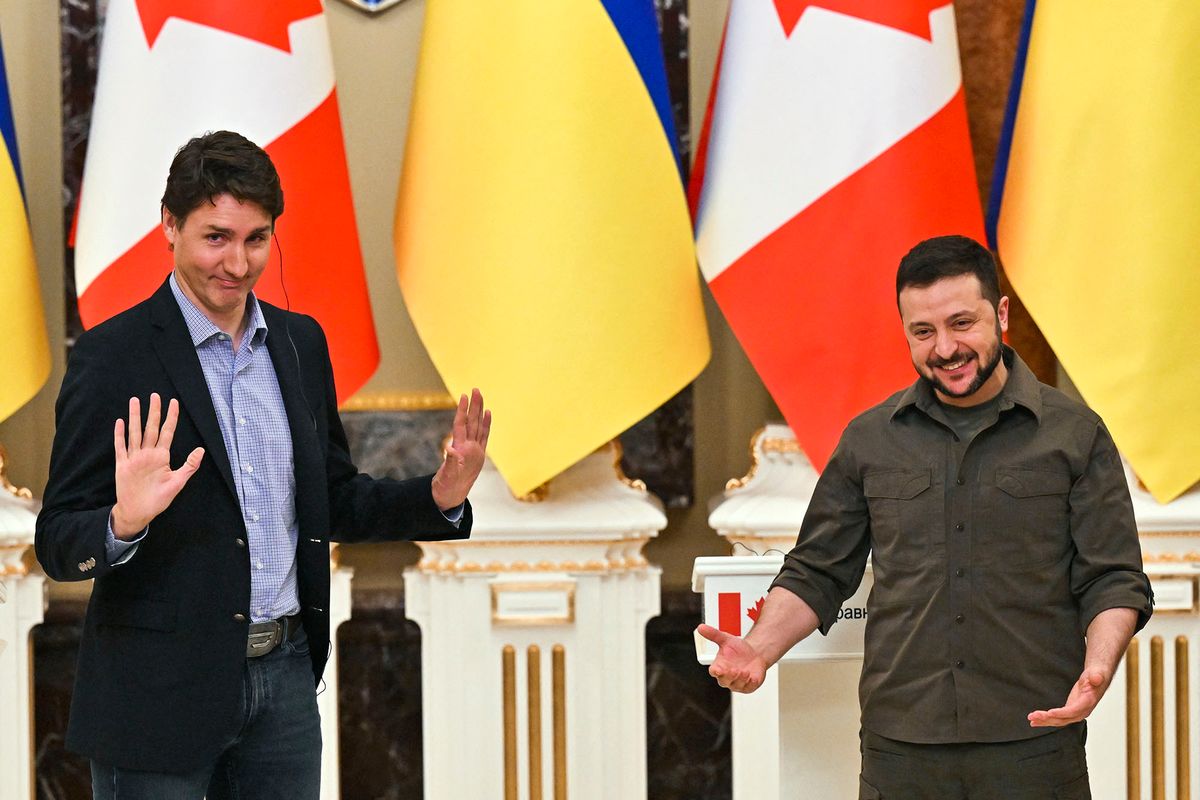 Ukrainian President Volodymyr Zelensky (R) and Canada's Prime Minister Justin Trudeau (L) gestures during a joint press conference in Kyiv on May 8, 2022 amid the Russian invasion of Ukraine. - Canadian Prime Minister Justin Trudeau visited Irpin outside the capital of Ukraine, its mayor said, where Russian forces were accused of atrocities against civilians, before meeting with President Zelensky and reaffirm Canada's unwavering support for the Ukrainian people." (Photo by Sergei SUPINSKY / AFP)