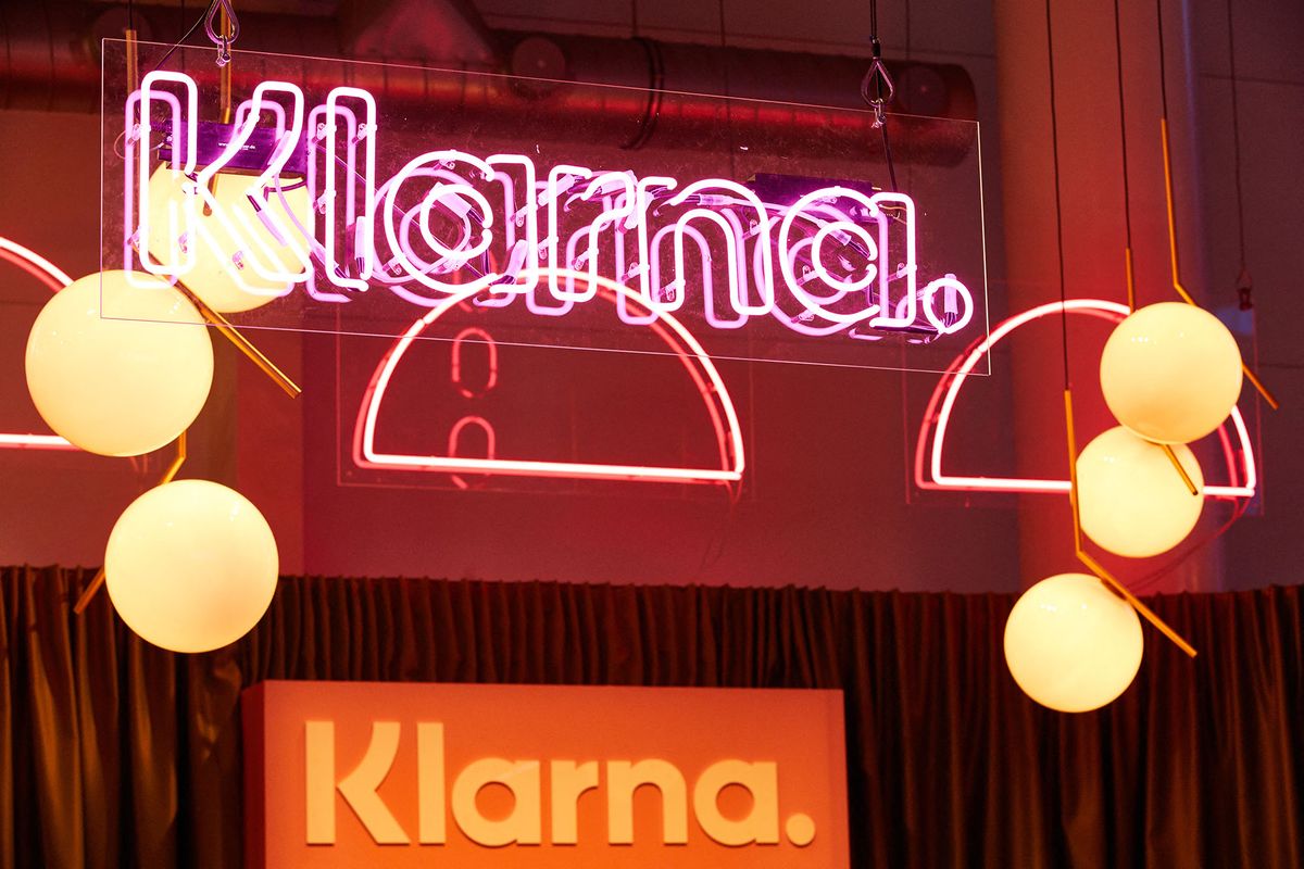 07 May 2019, Hamburg: The illuminated sign "Klarna" hangs on the stand of the company of the same name at the marketing trade fair "Online Marketing Rockstars" (OMR) in the exhibition halls. Photo: Georg Wendt/dpa (Photo by Georg Wendt / DPA / dpa Picture-Alliance via AFP)
