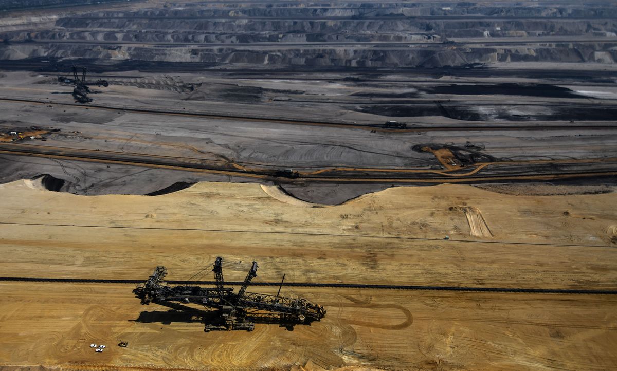 The aerial view taken on May 8, 2020 shows a bucket wheel excavator of German energy giant RWE at the Garzweiler opencast lignite coal mine in Juechen, western Germany. (Photo by Ina FASSBENDER / AFP)