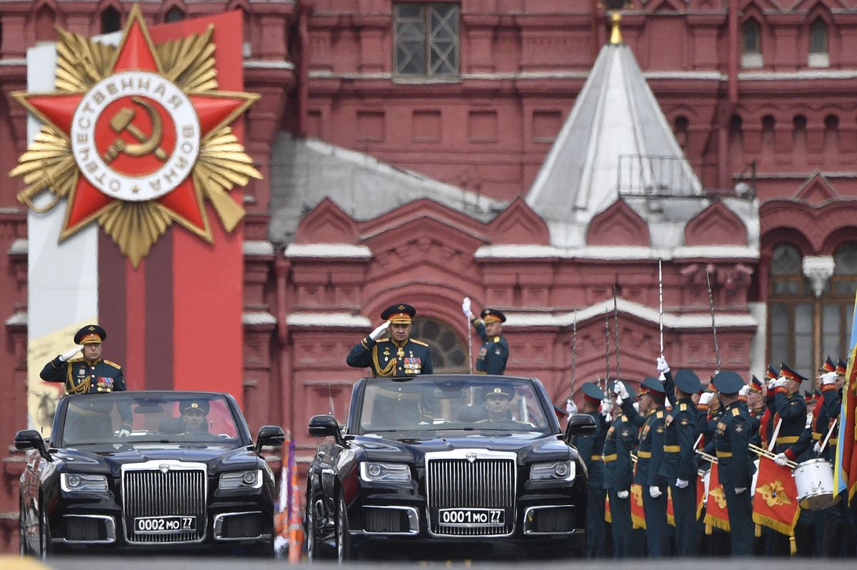 Russian Defence Minister Sergei Shoigu salutes to soldiers as he is driven along Red Square during the Victory Day military parade in central Moscow on May 9, 2022. - Russia celebrates the 77th anniversary of the victory over Nazi Germany during World War II. (Photo by Alexander NEMENOV / AFP)