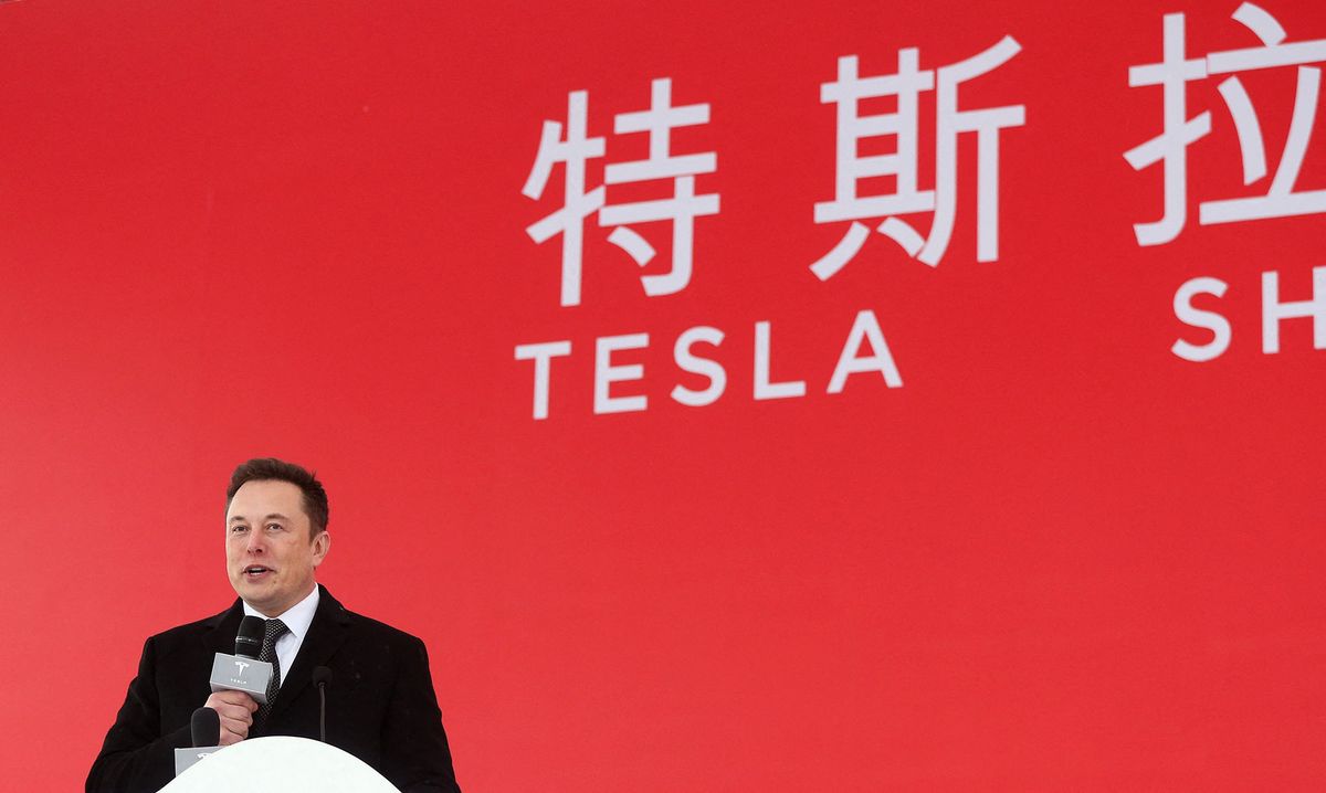 (190107) -- SHANGHAI, Jan. 7, 2019 (Xinhua) --    Tesla CEO Elon Musk speaks at the groundbreaking ceremony of Tesla Shanghai Gigafactory in Shanghai, east China, Jan. 7, 2019.    U.S. electric carmaker Tesla Inc. on Monday broke ground on its Shanghai factory, becoming the first to benefit from a new policy allowing foreign carmakers to set up wholly-owned subsidiaries in China. The new plant, Tesla's first outside the United States, is located in Lingang Area, a high-end manufacturing park in the southeast harbor of Shanghai. It is designed with an annual capacity of 500,000 electric cars. Tesla signed the agreement with the Shanghai municipal government in July 2018 to build the factory. In October, the company was approved to use an 864,885-square-meter tract of land in Lingang for its Shanghai plant.    (Xinhua/Ding Ting) (Photo by XINHUA / Xinhua via AFP)