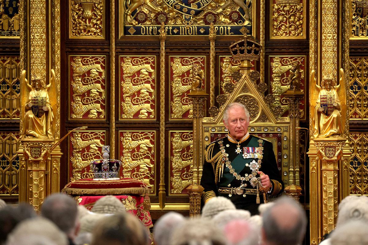 LONDON, ENGLAND - MAY 10: Prince Charles, Prince of Wales sits by the Imperial State Crown as he delivers the Queen’s Speech during the state opening of Parliament at the House of Lords on May 10, 2022 in London, England. The State Opening of Parliament formally marks the beginning of the new session of Parliament. It includes Queen's Speech, prepared for her to read from the throne, by her government outlining its plans for new laws being brought forward in the coming parliamentary year. This year the speech will be read by the Prince of Wales as HM The Queen will miss the event due to ongoing mobility issues. (Photo by Dan Kitwood/Getty Images) 1240575769