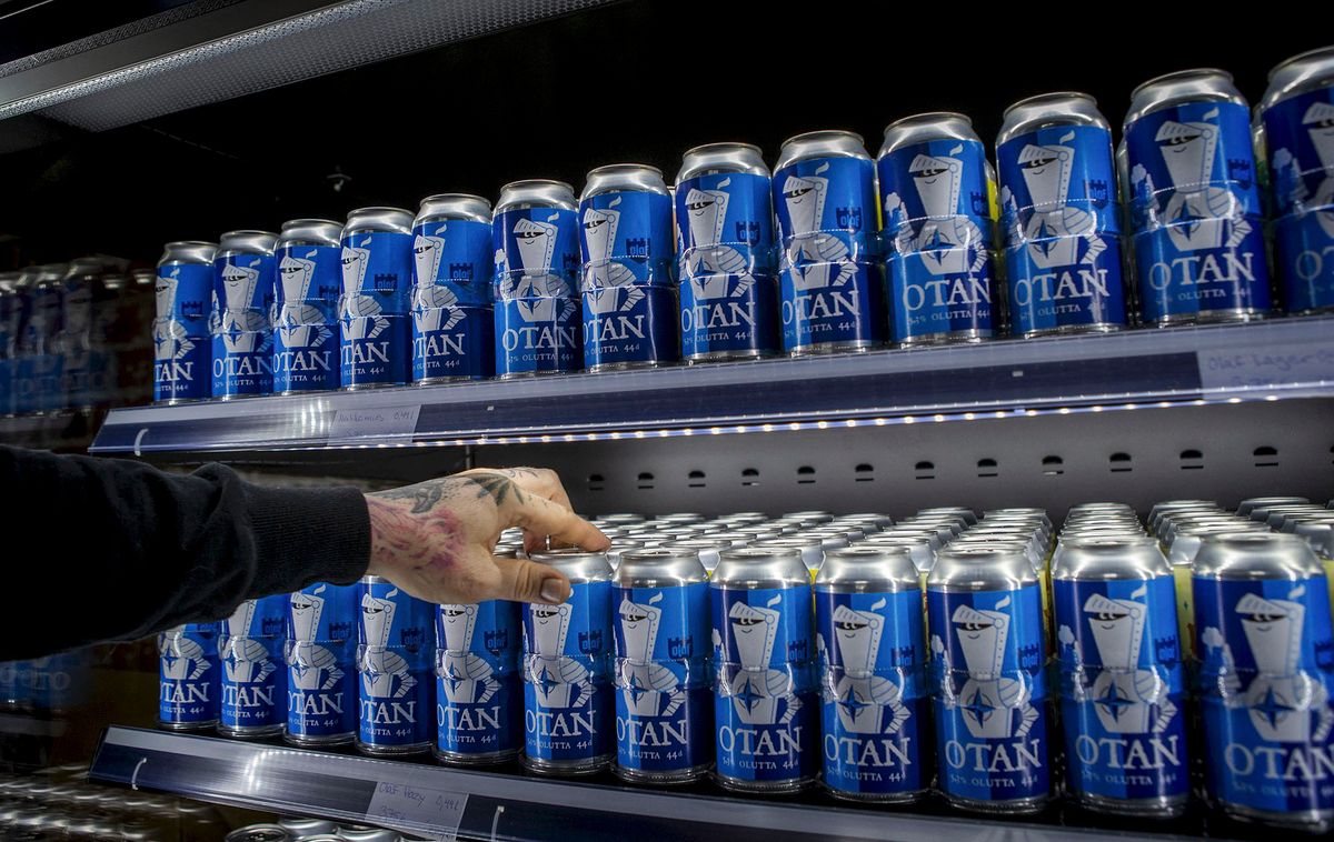 Nato-branded OTAN beer cans produced by the Olaf Brewing Company are pictured in Savonlinna, eastern Finland, on May 17, 2022. (Photo by Soila Puurtinen / LEHTIKUVA / AFP) / Finland OUT