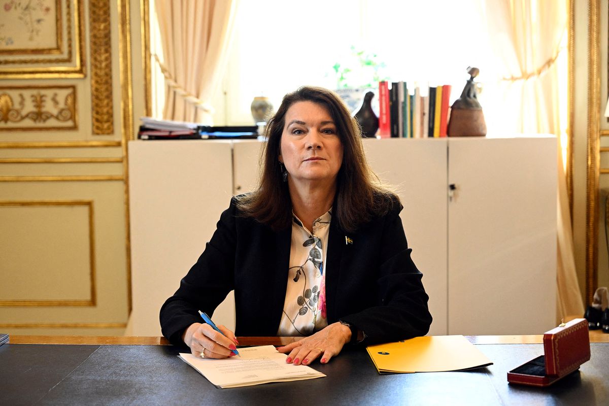 Sweden's Minister of ForeÌgn Affairs Ann Linde signs Sweden's application for NATO membership at the Ministry of Foreign Affairs in Stockholm, Sweden, on May 17, 2022. (Photo by Henrik MONTGOMERY / TT News Agency / AFP) / Sweden OUT