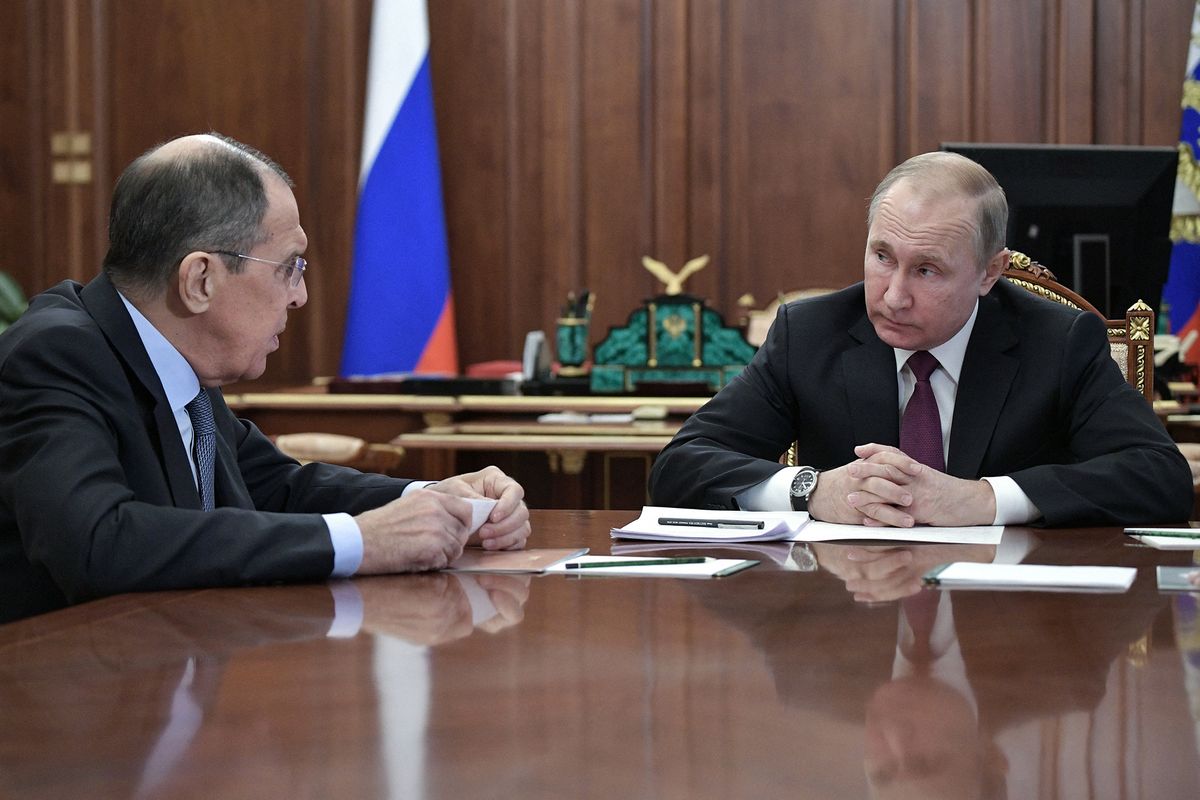 President Vladimir Putin meets with Foreign Minister Lavrov and Defence Minister Shoigu