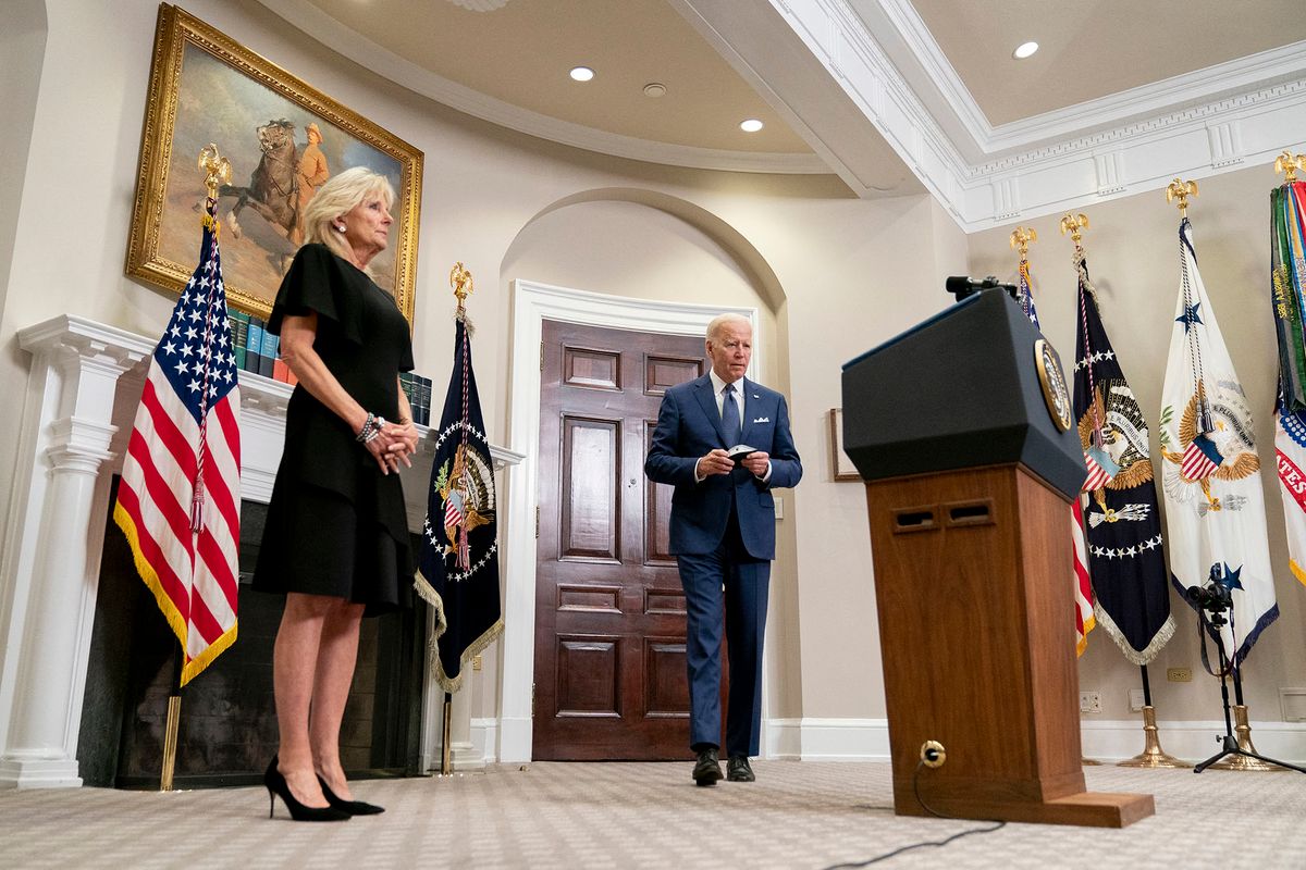 US First Lady Jill Biden looks on as US President Joe Biden arrives to deliver remarks in the Roosevelt Room of the White House in Washington, DC, on May 24, 2022, after a gunman shot dead 18 young children at an elementary school in Texas. - US President Joe Biden on Tuesday called for Americans to stand up against the country's powerful pro-gun lobby after a gunman shot dead 18 young children at an elementary school in Texas."When, in God's name, are we going to stand up to the gun lobby," he said in an address from the White House."It's time to turn this pain into action for every parent, for every citizen of this country. We have to make it clear to every elected official in this country: it's time to act." (Photo by Stefani Reynolds / AFP)