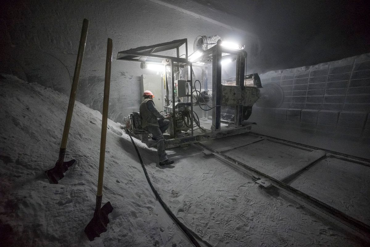 463837920 A worker operates a driller excavator machine used to cut salt into blocks in the underground mine at the Artemsol SE salt factory in Soledar, Ukraine, on Wednesday, Feb. 18, 2015. Ukraine's worst recession since 2009 intensified last quarter, highlighting the nation's challenge after sealing an expanded $17.5 billion bailout and agreeing on a truce in the war that's devastated its industrial base. Photographer: Vincent Mundy/Bloomberg via Getty Images