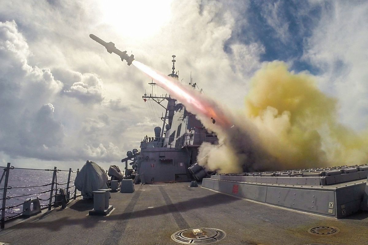 This US Navy photo obtained August 13, 2015 shows the Arleigh Burke-class guided-missile destroyer USS Fitzgerald (DDG 62)as it  fires a Harpoon missile during a live-fire drill on August 12, 2015 in the waters near Guam. Fitzgerald is on patrol in the US 7th Fleet area of responsibility supporting security and stability in the Indo-Asia-Pacific region. AFP PHOTO/US NAVY/ PATRICK DIONNE  =  RESTRICTED TO EDITORIAL USE / MANDATORY CREDIT: "AFP PHOTO HANDOUT-US NAVY /PATRICK DIONNE"/ NO MARKETING - NO ADVERTISING CAMPAIGNS / DISTRIBUTED AS A SERVICE TO CLIENTS= (Photo by PATRICK DIONNE / US NAVY / AFP)