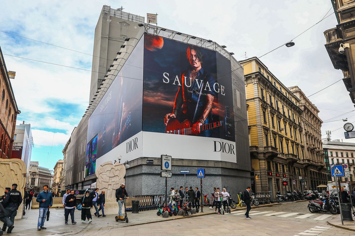 A billboard showing actor Johnny Depp promoting Dior aftershave Sauvage in Milan, Italy on October 6, 2021.  (Photo by Beata Zawrzel/NurPhoto) (Photo by Beata Zawrzel / NurPhoto / NurPhoto via AFP)