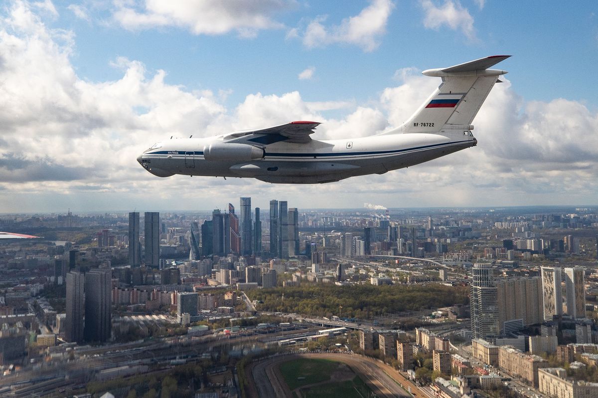 8183313 04.05.2022 An Ilyushin Il-76MD military transport aircraft flies during a rehearsal for the Victory Day parade, which marks the 77th anniversary of the victory over Nazi Germany in World War Two, in Moscow, Russia. Nina Parshina / Sputnik (Photo by Nina Parshina / Sputnik / Sputnik via AFP)