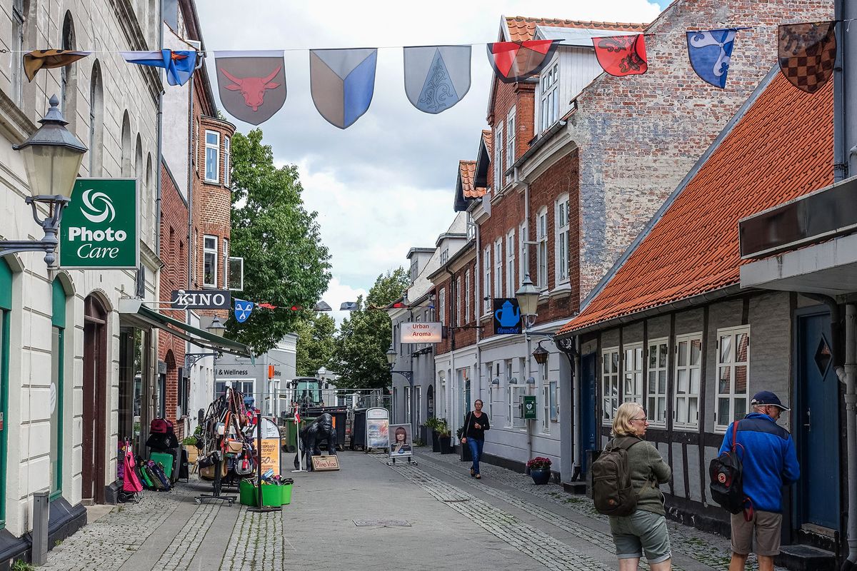Pedestrian shopping area with shops, restaurants and cafes is seen in Nyborg , Fyn (Funen), Denmark, on 2 August 2021  (Photo by Michal Fludra/NurPhoto) (Photo by Michal Fludra / NurPhoto / NurPhoto via AFP)