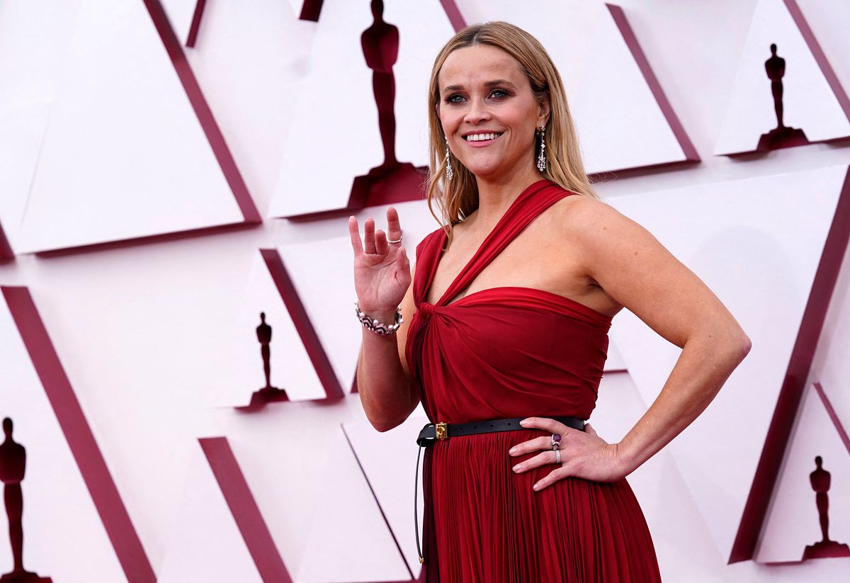 US actress Reese Witherspoon arrives at the Oscars on April 25, 2021, at Union Station in Los Angeles. (Photo by Chris Pizzello / POOL / AFP)