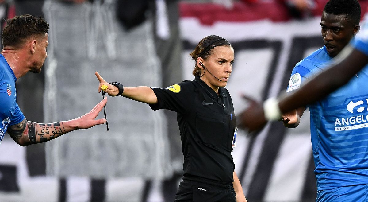 French referee Stephanie Frappart gestures during the French L2 football match between Valenciennes and Beziers on April 19, 2019 at the Hainaut Stadium in Valenciennes. - Stephanie Frappart has been selected among 27 referees for the 2019 World Cup in France next summer (7 June - 7 July). (Photo by FRANCK FIFE / AFP)
