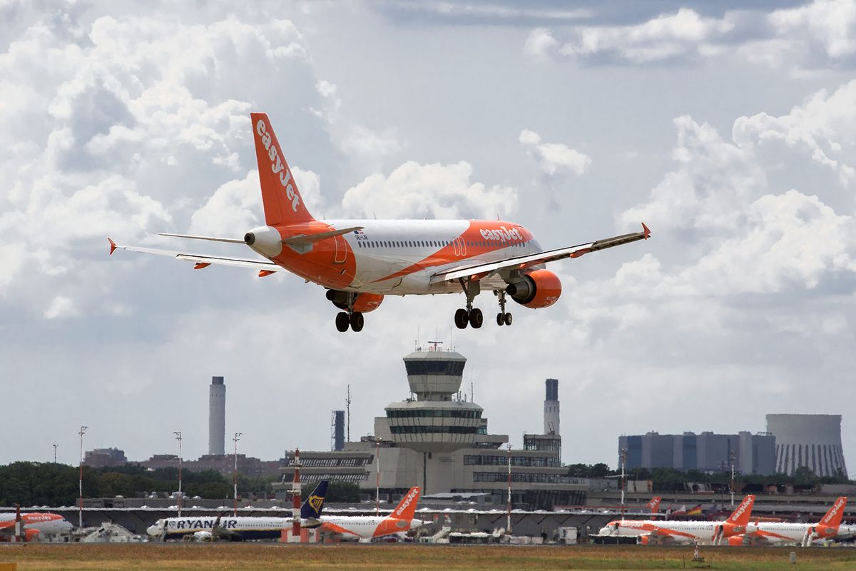13 July 2019, Berlin: An airplane of the airline easyJet lands at the airport Tegel. After the start of the holidays in North Rhine-Westphalia, all federal states except Bavaria and Baden-W¸rttemberg now have no schooling. High passenger numbers are expected at the airports. Photo: Soeren Stache/dpa (Photo by SOEREN STACHE / DPA / dpa Picture-Alliance via AFP)