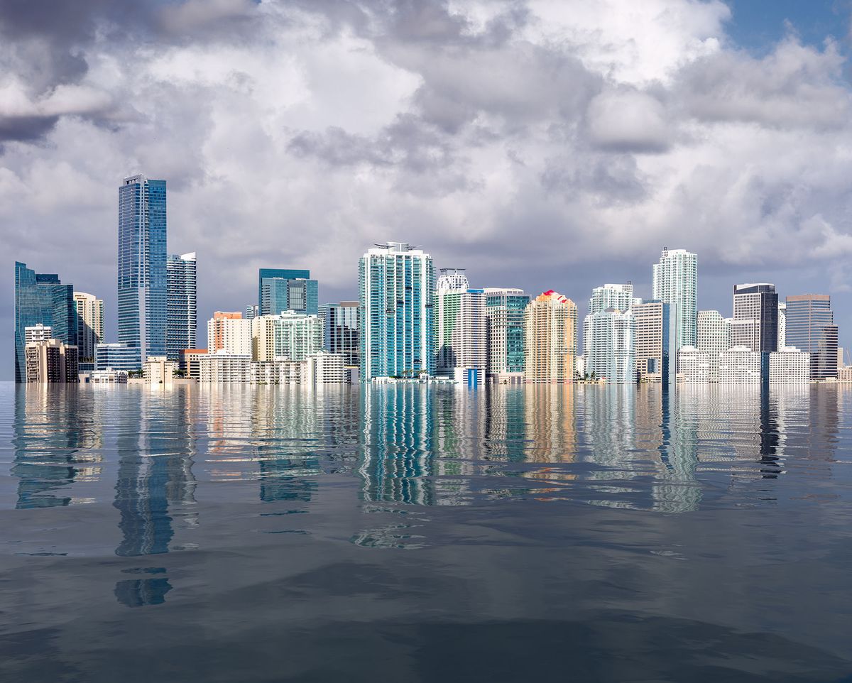 1171148590 Miami Florida cityscape skyline with concept of sea level rise and major flooding from warming or hurricane damage