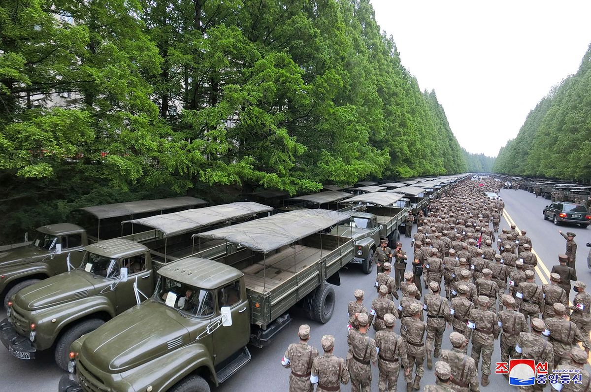 This picture taken on May 16, 2022 and released from North Korea's official Korean Central News Agency (KCNA) on May 17 shows officers of the military medical field of the Korean People's Army going to supply medicines to resolve the epidemic prevention crisis over the spread of Covid-19 coronavirus, in Pyongyang. (Photo by KCNA VIA KNS / AFP) / - South Korea OUT / ---EDITORS NOTE--- RESTRICTED TO EDITORIAL USE - MANDATORY CREDIT "AFP PHOTO/KCNA VIA KNS" - NO MARKETING NO ADVERTISING CAMPAIGNS - DISTRIBUTED AS A SERVICE TO CLIENTSTHIS PICTURE WAS MADE AVAILABLE BY A THIRD PARTY. AFP CAN NOT INDEPENDENTLY VERIFY THE AUTHENTICITY, LOCATION, DATE AND CONTENT OF THIS IMAGE. /