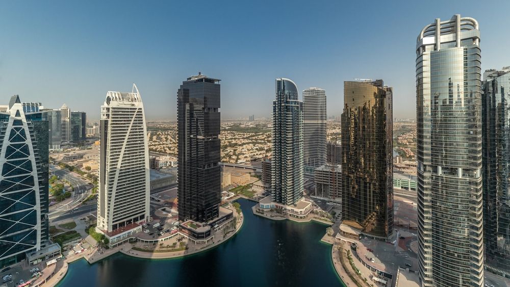 Tall,Residential,Buildings,At,Jlt,District,Aerial,Timelapse,During,Sunset,
