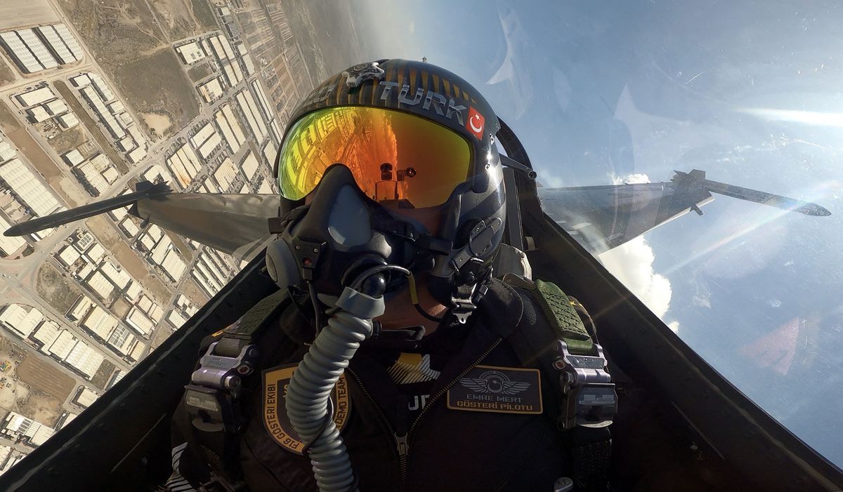KONYA, TURKIYE - APRIL 21: Pilot Major Emre Mert of SOLOTURK, the aerobatic team of the Turkish Air Force, is seen in the F-16 cockpit as he performs demonstration flight rehearsal at the 3rd Main Jet Base Command in Konya, Turkiye on May 11, 2022. It was the first demonstration team in the world to perform the "Cobra Maneuver", "maintaining straight flight by rearing the aircraft nose up at the lowest speed at low altitude", with an F-16 fighter aircraft for the first time in the world. Evrim Aydin / Anadolu Agency (Photo by Evrim Aydin / ANADOLU AGENCY / Anadolu Agency via AFP)