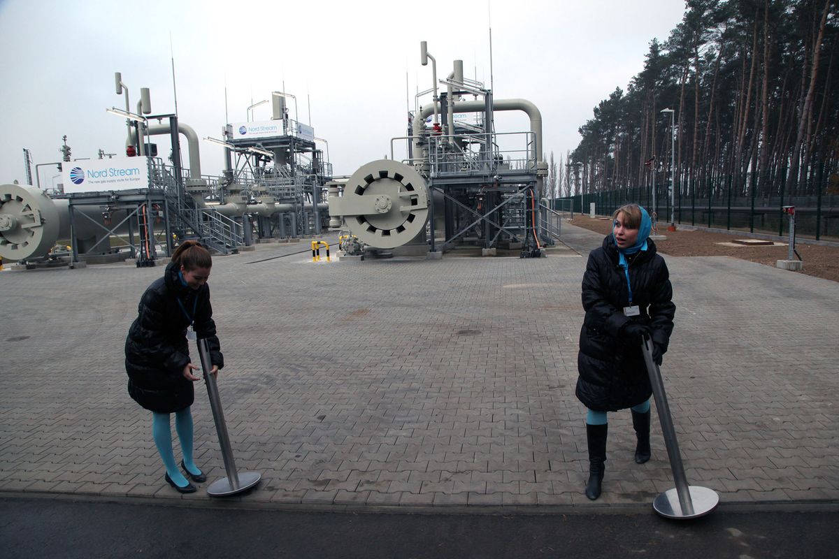 131918200 LUBMIN, GERMANY - NOVEMBER 08:  Two women prepare the arrival of the guest at the central facility where the Nord Stream Baltic Sea gas pipeline reaches western Europe prior to the pipeline's official inauguration on November 8, 2011 in Lubmin, Germany. A host of European leaders, including German Chancellor Angela Merkel, Russian President Dmitry Medvedev, Dutch Prime Minister Mark Rutte and French Prime Minister Francois Fillon are scheduled to preside over the inauguration in a ceremony later in the day. The Nord Stream pipeline runs through the Baltic Sea and will supply Europe with natural gas from Russia. (Photo by Sasha Mordovets/Getty Images)