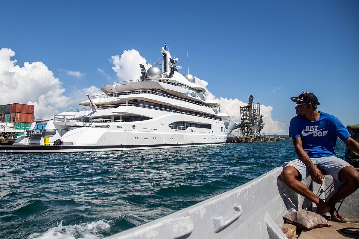 A photo taken on April 13, 2022 shows the superyacht Amadea, reportedly owned by a Russian oligarch, berthed at the Queens Wharf in Lautoka. - Fijian authorities on April 19 applied to block a superyacht reportedly owned by Russian oligarch Suleiman Kerimov from leaving its waters, as the United States moved to seize it due to US and European Union sanctions over Russia's invasion of Ukraine. (Photo by Leon LORD / FIJI SUN / AFP)