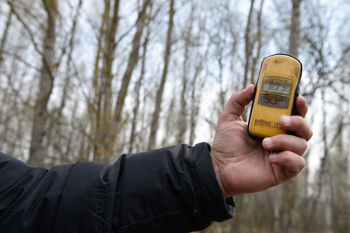 3066892 04/05/2017 Radiation level measured with a dosimeter at the Chernobyl nuclear power plant's exclusion area. Stringer/Sputnik (Photo by Stringer / Sputnik / Sputnik via AFP)
