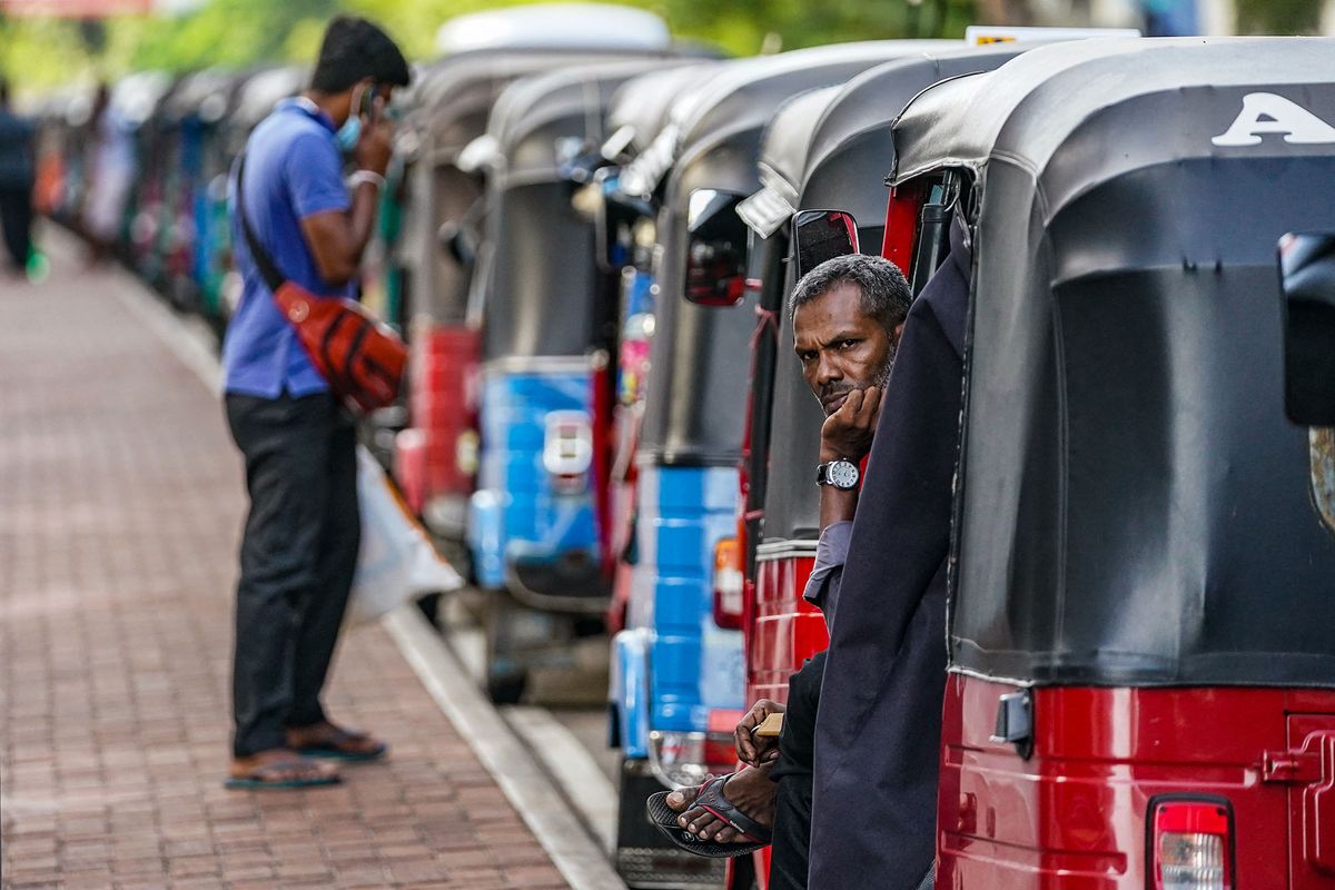 A man waiting for fuel due to the acute fuel crisis in Sri Lanka. 27 June, 2022 Colombo, Sri Lanka (Photo by Thilina Kaluthotage/NurPhoto) (Photo by Thilina Kaluthotage / NurPhoto / NurPhoto via AFP)