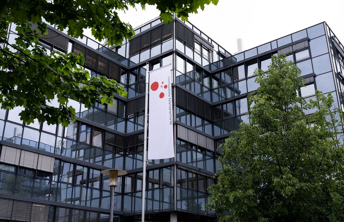 24 May 2022, Bavaria, Planegg: The logo of the biotechnology company Bavarian Nordic is seen on a sign on a company building. Bavarian Nordic is the manufacturer of Imvanex, a vaccine against smallpox. Photo: Sven Hoppe/dpa (Photo by SVEN HOPPE / DPA / dpa Picture-Alliance via AFP)