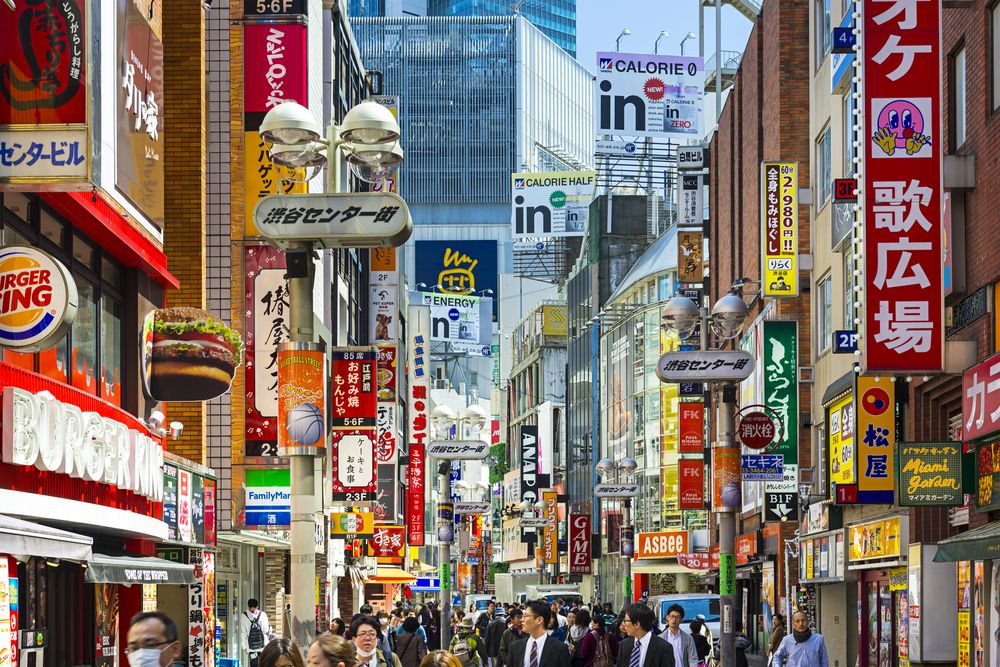 Tokyo,,Japan,-,March,31,,2014:,Pedestrians,Stroll,Down,Shibuya