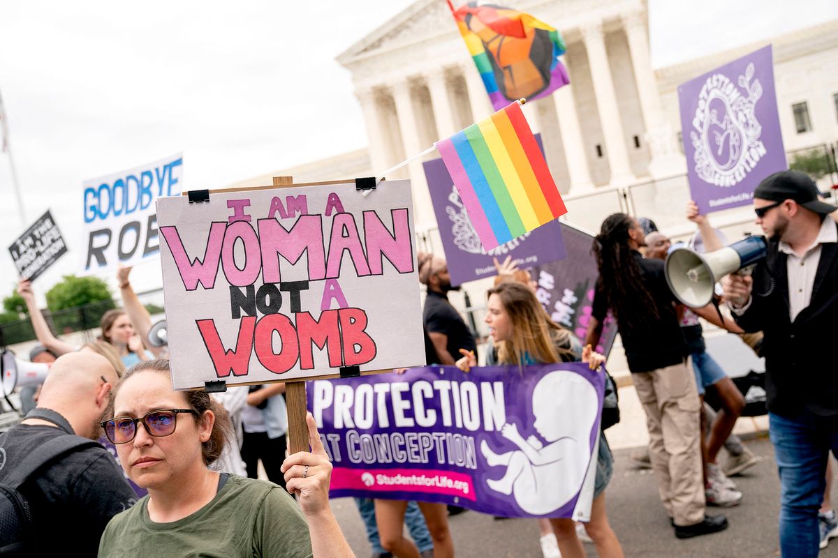 Pro-choice and anti-abortion demonstrators gather in front of the US Supreme Court in Washington, DC, on June 21, 2022. - The US Supreme Court released five decisions today, but decisions in cases regarding abortion rights, guns, climate change, and immigration are still expected by the end of their term. (Photo by Stefani Reynolds / AFP)