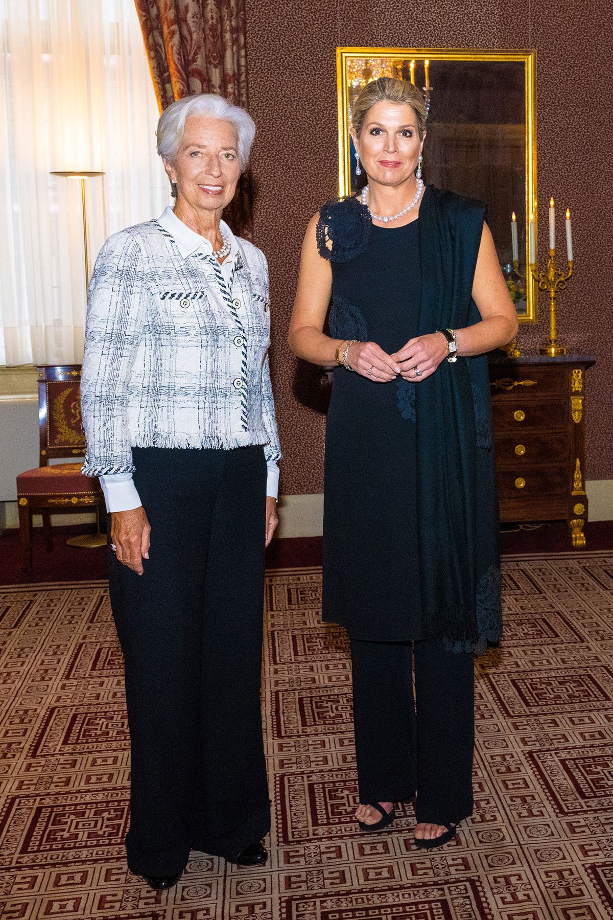 Queen Maxima of The Netherlands (R) poses with President of the European Central Bank (ECB) Christine Lagarde prior to a dinner with European central bank heads in Amsterdam, on June 8, 2022. - . (Photo by Mischa Schoemaker / various sources / AFP) / Netherlands OUT