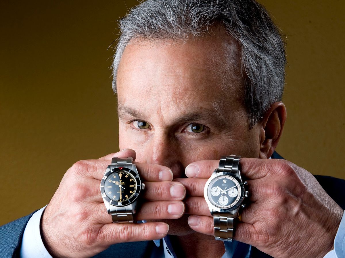 1034807500 HUNTINGTON BEACH, CA - FEBRUARY 28: Paul Altieri, owner of Bob's Watches in Westminster, a vintage 1955 Rolex Submariner, left, #6536, estimated worth of $25,000 and a  vintage 1966 Rolex Daytona, #6239 "Paul Newman" worth an estimated $75,000.///ADDITIONAL INFORMATION: watches √ê 2/28/13 √ê LEONARD ORTIZ, ORANGE COUNTY REGISTER √ê Paul Altieri, owner of Bob's Watches, has created what he calls the first online "stock exchange" for high-end Rolex watches, enabling people to buy and sell them in much the way they might buy and sell Apple or Google stock. This business centerpiece story will concentrate on Altieri and also tell the broader story of ultra-high-end watches -- timepieces that cost upwards of $5,000 and $10,000 apiece. Some even go up to $100,000 or $1 million or more. In any age when no one really needs a wristwatch, costly watches have an appeal for many other reasons. NOTE: In addition to shooting Altieri, we'd like to do sort of a photo graphic that would involve four or five good close-up shots of Altieri's best collectible Rolexes -- for example, the Rolex Daytona model from the 1950s that's identical to the watch that actor and race driver Paul Newman used to wear.  (Photo by Leonard Ortiz/Digital First Media/Orange County Register via Getty Images)
