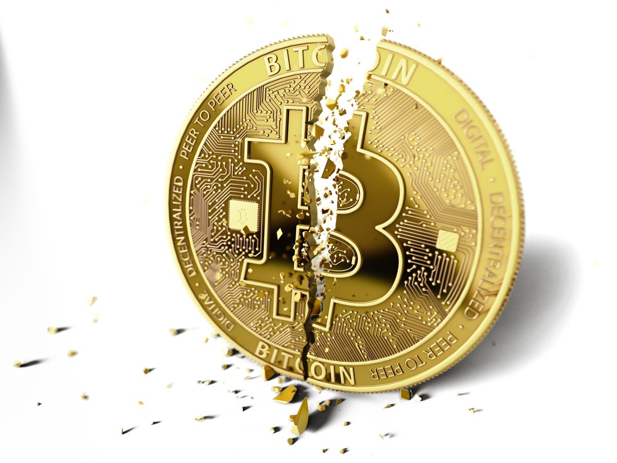 A,Broken,Or,Cracked,Bitcoin,On,White,Background.,Isolated,On