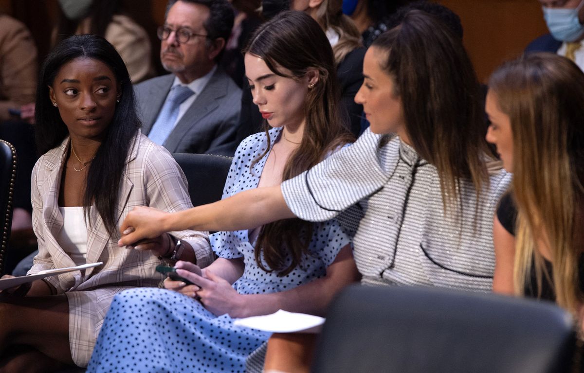 US Olympic gymnasts (L-R) Simone Biles, McKayla Maroney,  Aly Raisman and Maggie Nichols, arrive to testify during a Senate Judiciary hearing about the Inspector General's report on the FBI handling of the Larry Nassar investigation of sexual abuse of Olympic gymnasts, on Capitol Hill, September 15, 2021, in Washington, DC. (Photo by SAUL LOEB / POOL / AFP)
