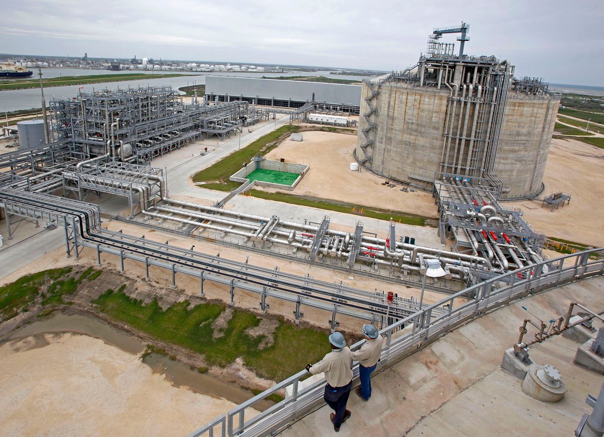 94951080 UNITED STATES - APRIL 01:  Operators Maurice Jones, left, and supervisor Chad Horton, look down on the Freeport LNG facility in Quintana, Texas, U.S., on Wednesday, April 1, 2009. This facility boasts two gigantic LNG tanks that can each store 1 million barrels of LNG at 260 degrees below zero after being off loaded from tanker ships at their nearby dock. The cold LNG is then vaporized and transferred to pipelines at 1200 psi.  (Photo by Craig Hartley/Bloomberg via Getty Images)