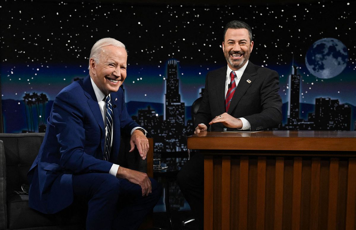 US President Joe Biden sits next to host Jimmy Kimmel as he makes his first in-person appearance on "Jimmy Kimmel Live!" during his Los Angeles visit to attend the Summit of the Americas, in Hollywood, California, June 8, 2022. (Photo by Jim WATSON / AFP)