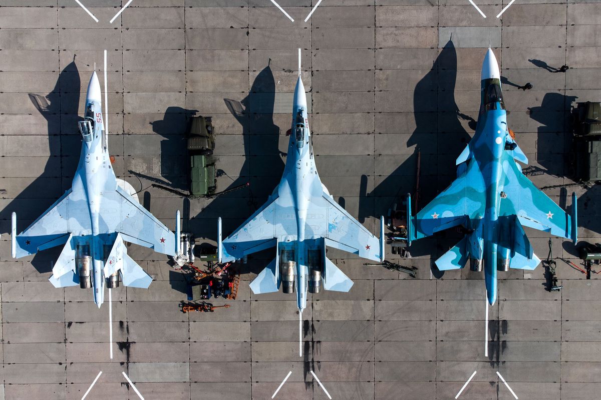 6505717 02.04.2021 An aerial view shows Su-27 aircrafts during the Aviadarts competition, on the territory of the aviation regiment of the Southern Military District, Krasnodar region, Russia.  Vitaly Timkiv / Sputnik (Photo by Vitaly Timkiv / Sputnik / Sputnik via AFP)