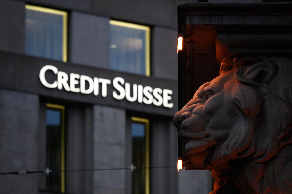 This photograph taken on November 4, 2020 shows a sign of Switzerland's second largest bank Credit Suisse on a branch's building in downtown Geneva. (Photo by Fabrice COFFRINI / AFP)