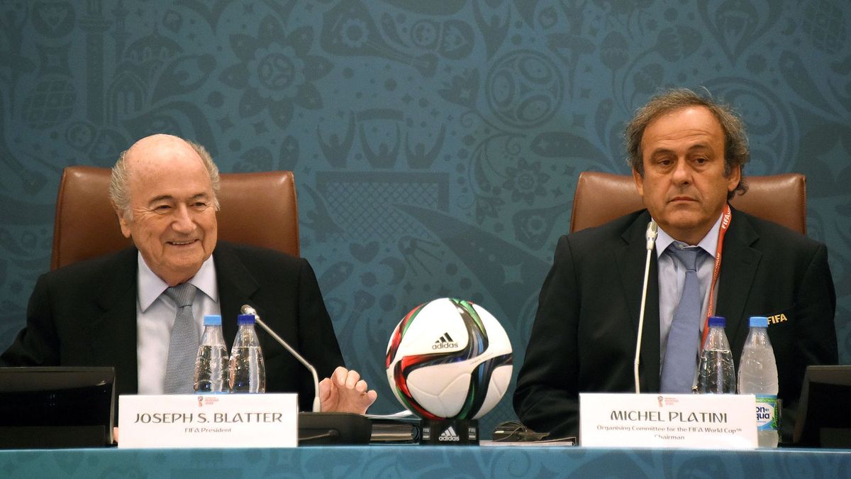 1037131960 FIFA President Joseph Blatter (L) smiles as he sits next to UEFA President Michel Platini (R) as they join a seminar ahead of the Preliminary Draw for the FIFA World Cup 2018, in St.Petersburg, Russia, 25 July 2015. Photo: MARCUS BRANDT/dpa | usage worldwide   (Photo by Marcus Brandt/picture alliance via Getty Images)