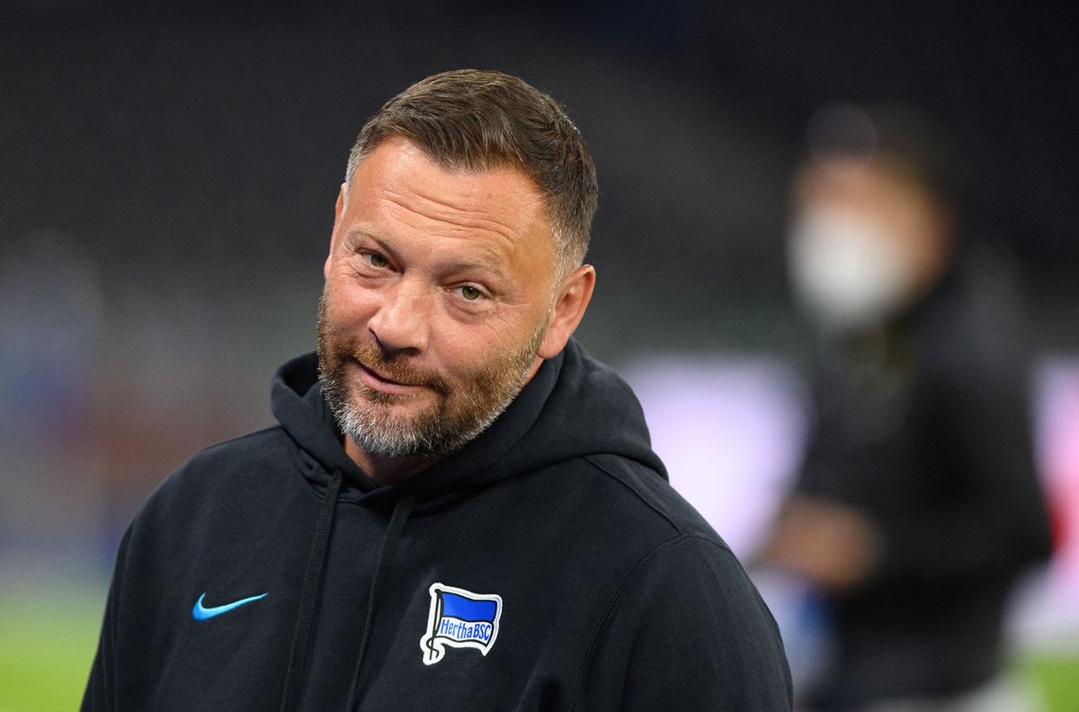 17 September 2021, Berlin: Football: Bundesliga, Hertha BSC - SpVgg Greuther F¸rth, Matchday 5, at the Olympiastadion. Hertha head coach Pal Dardai smiles before the start of the match. Photo: Soeren Stache/dpa-Zentralbild/dpa - IMPORTANT NOTE: In accordance with the regulations of the DFL Deutsche Fuﬂball Liga and/or the DFB Deutscher Fuﬂball-Bund, it is prohibited to use or have used photographs taken in the stadium and/or of the match in the form of sequence pictures and/or video-like photo series. (Photo by SOEREN STACHE / dpa-Zentralbild / dpa Picture-Alliance via AFP)