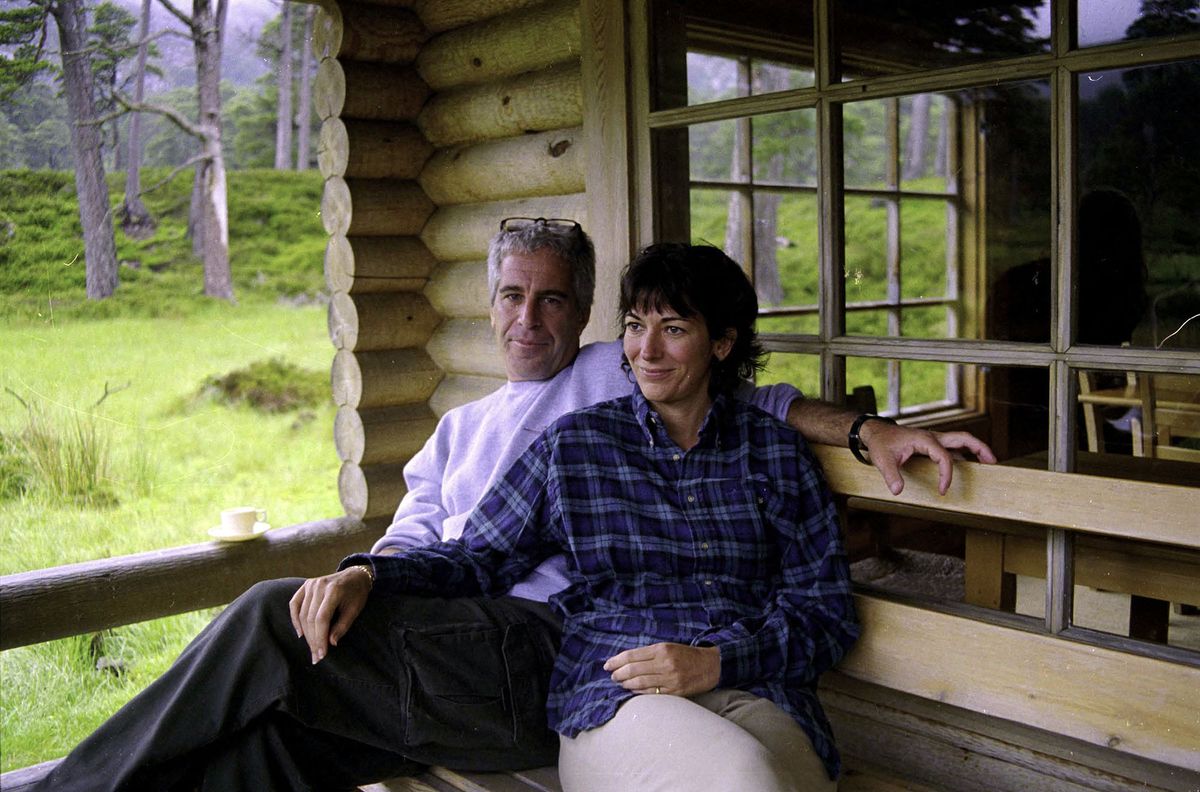 This undated trial evidence image obtained December 8, 2021, from the US District Court for the Southern District of New York shows British socialite Ghislaine Maxwell and US financier Jeffrey Epstein in Queenís log cabin at Balmoral. - Maxwell, 59, is on trial in New York, accused of grooming underage girls to be exploited by her long-time partner Epstein, who killed himself in jail in 2019 while awaiting trial. Maxwell has pleaded not guilty to six counts of enticing and transporting minors for sex. (Photo by Handout / US District Court for the Southern District of New York / AFP)